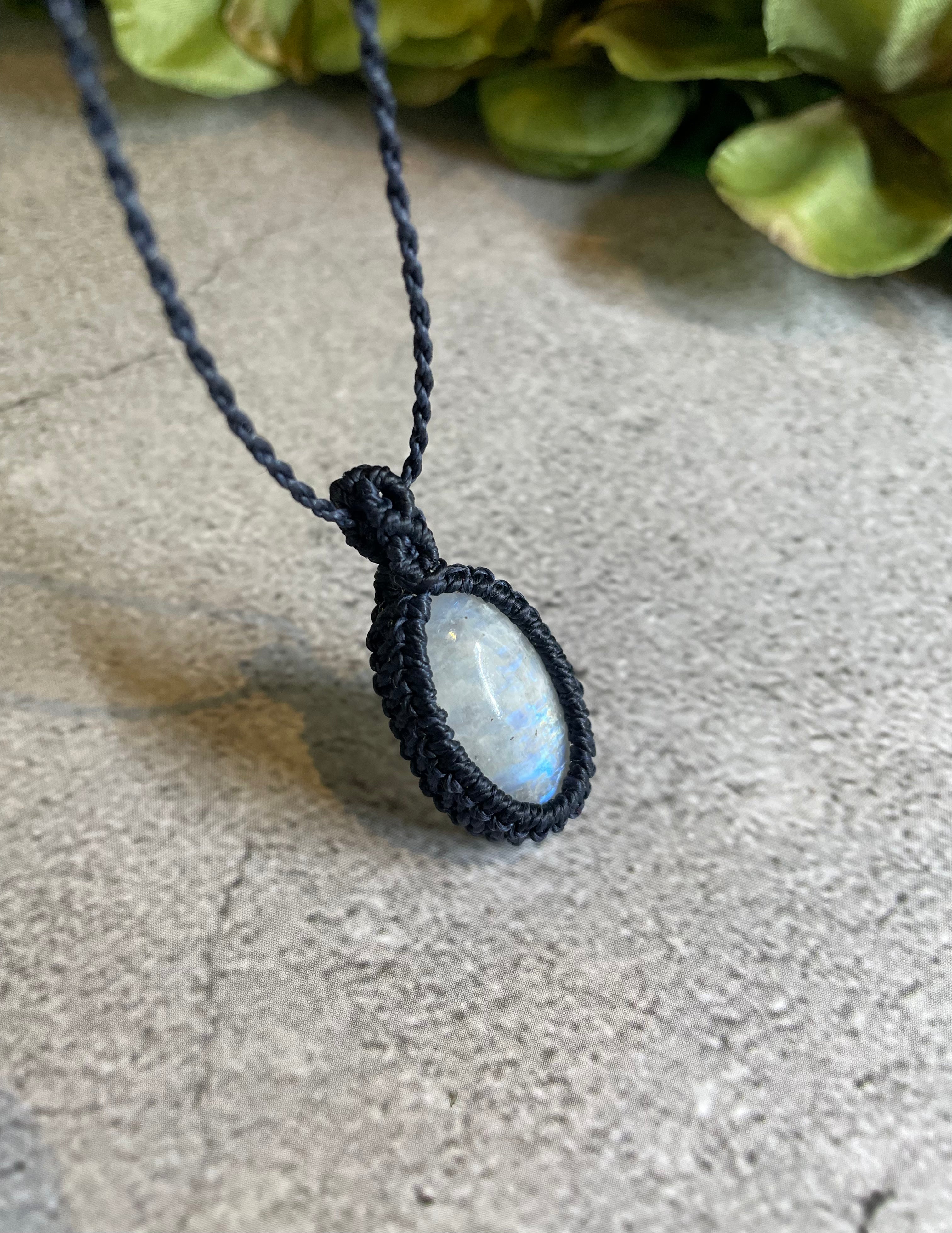 Offers Macramè pendant with moonstone.